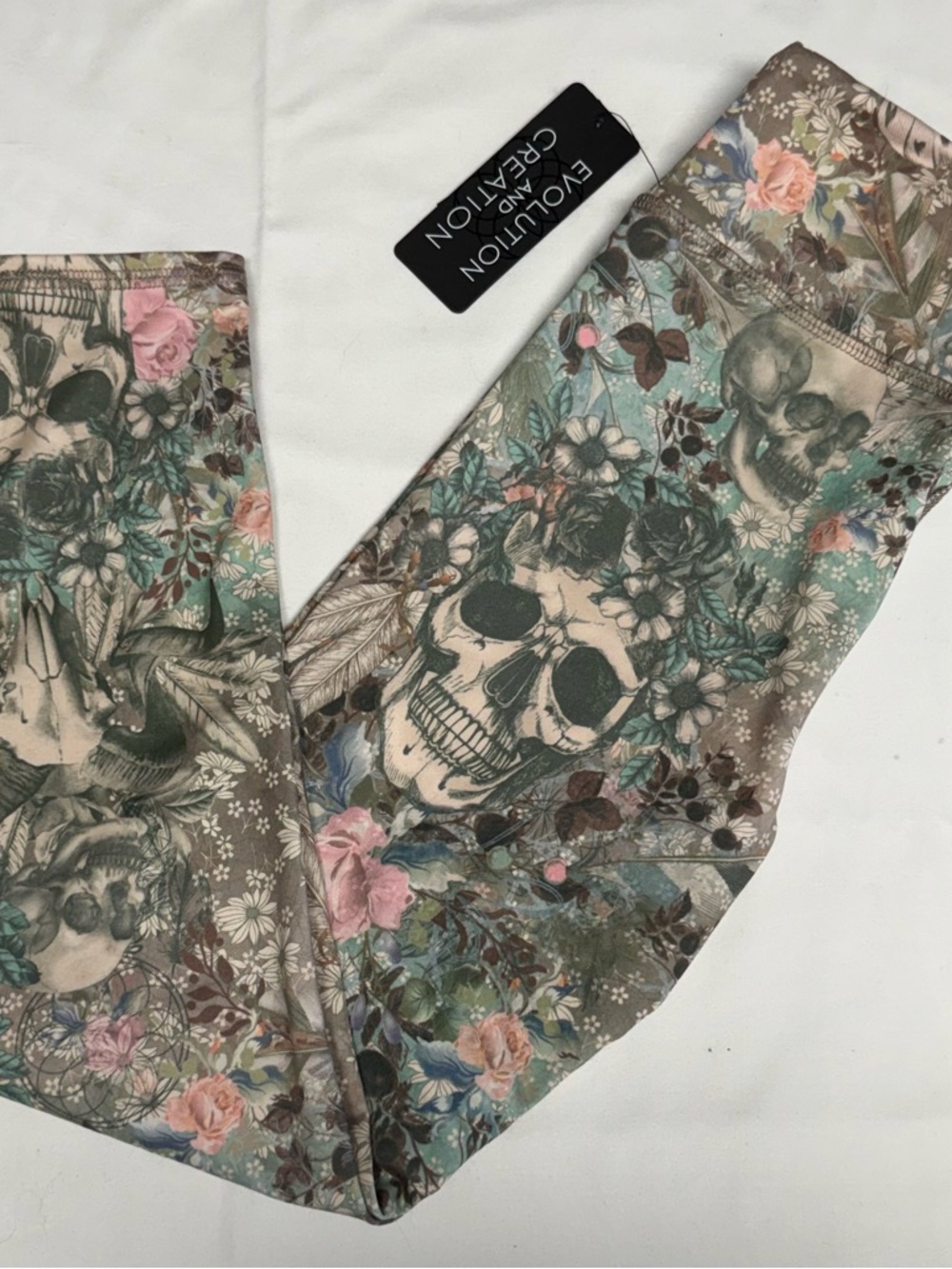 Evolution and Creation Beige, Teal & Pink Floral Skull Leggings